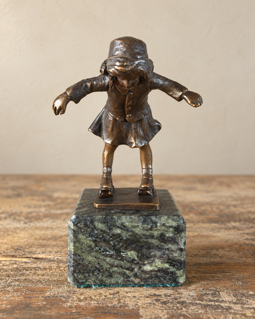 Grundman Vintage Bronze Miniature of a Girl on Roller-skates