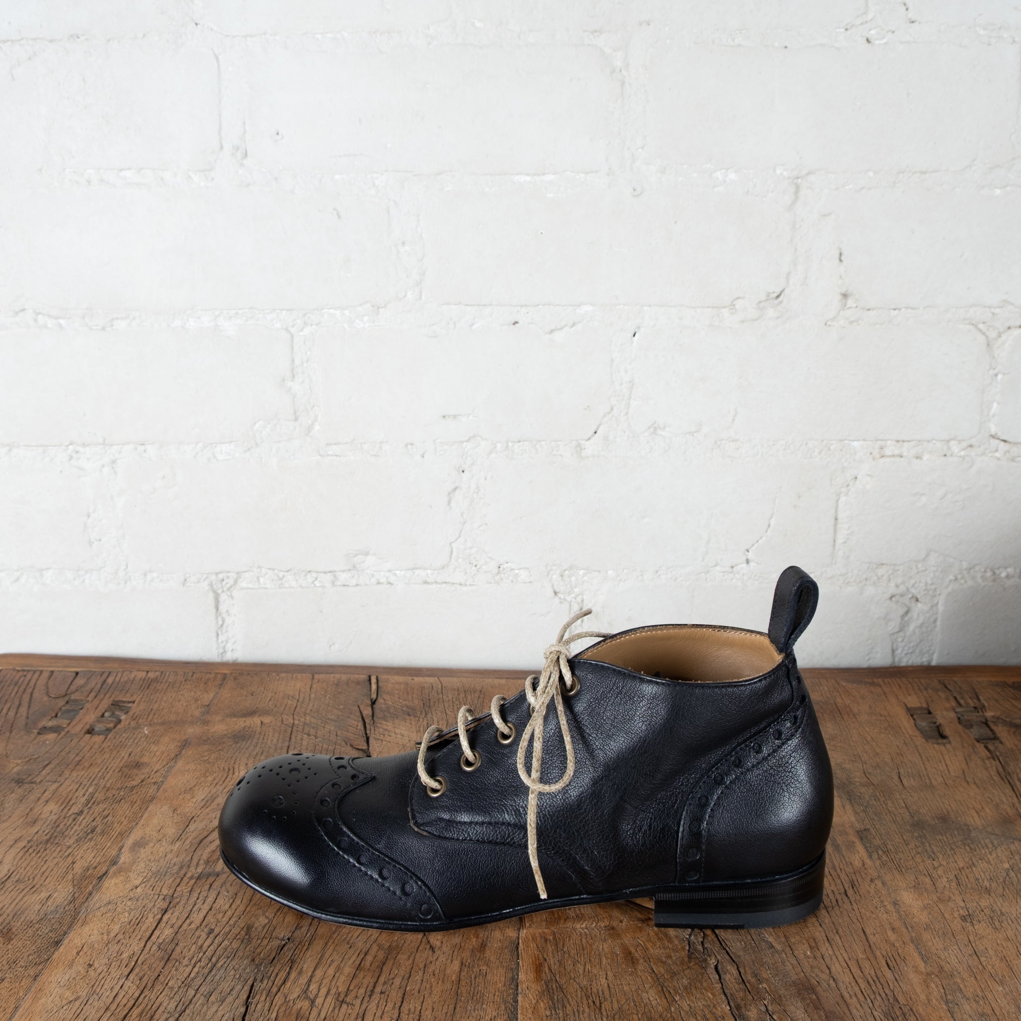 Victoria Varrasso Noir Leather Bootlettes