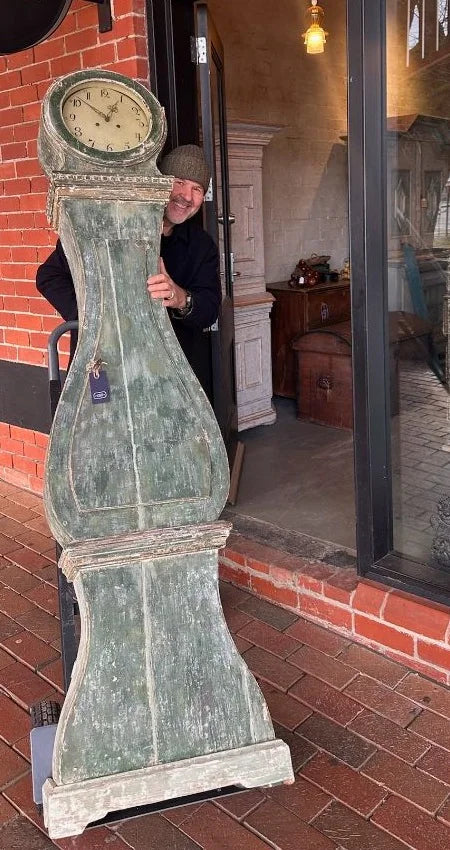 Loz moving an antique clock