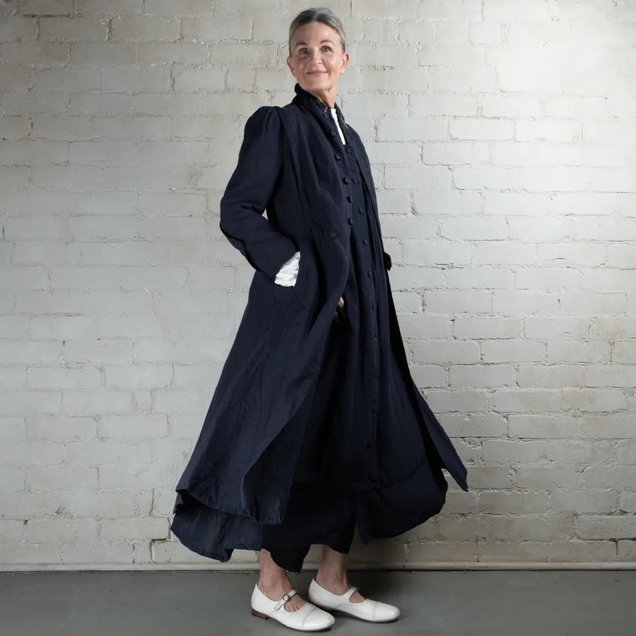 Melissa wearing a dark natural-fibre coat